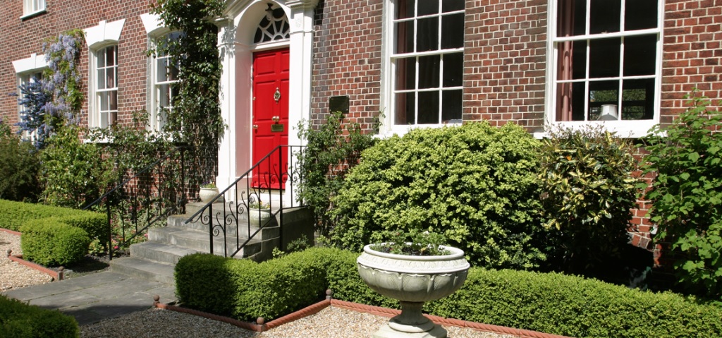 Sash Windows Experts Georgian double fronted house with red door