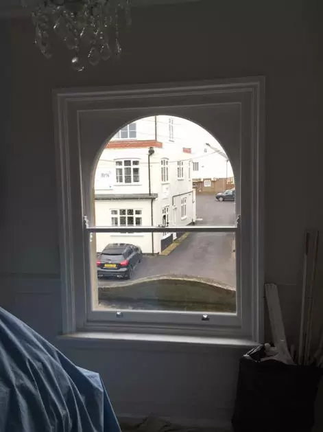 Beautiful curved headed hardwood double glazed replica sashes, after work completed