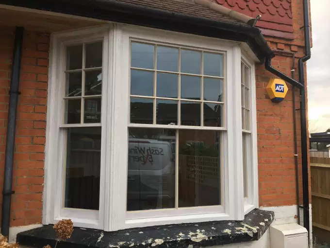 Hardwood double glazed sash bay in Reigate 3