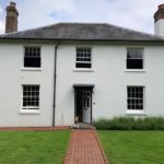 Sash window renovation on a detached villa in Canterbury, external view with windows open
